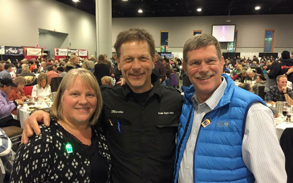 Dr. Michael McNamara, Martin Buser, and Joanne at the 2015 Musher’s Banquet