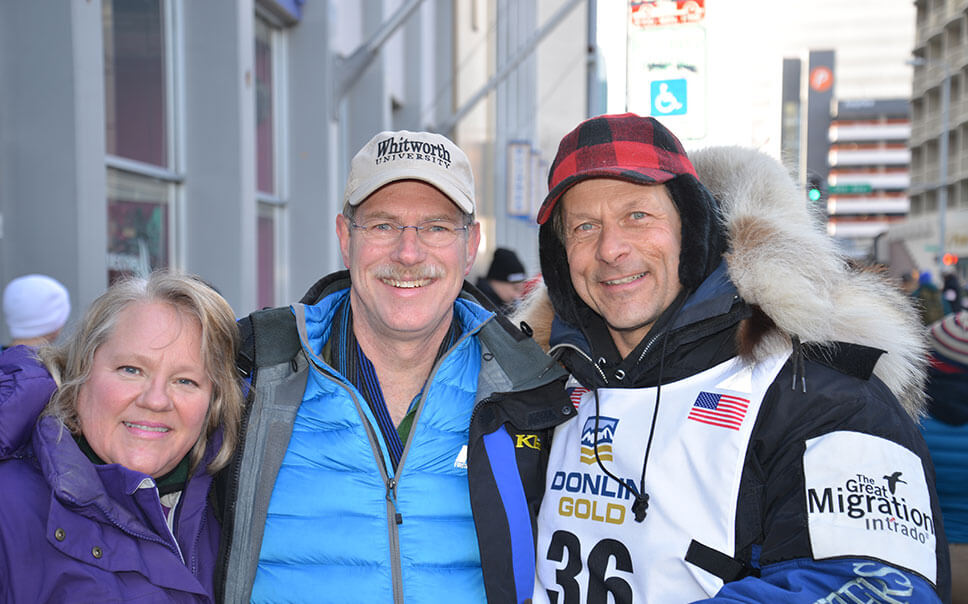 Joanne, Dr. McNamara, and Martin Buser at the Iditarod start.