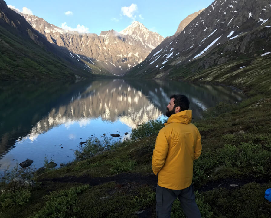 Dr. Gray hiking at Alaskan lake