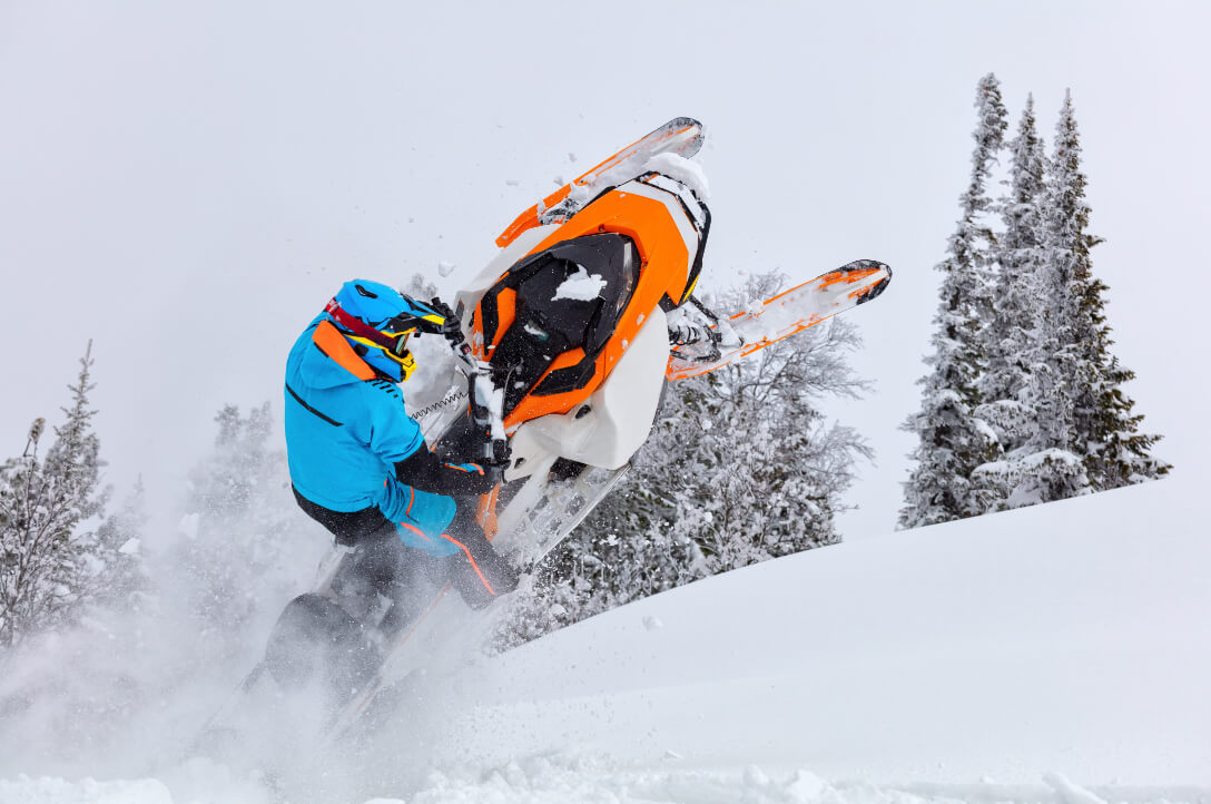 Orthopedic patient snowmobiles in Alaska winter